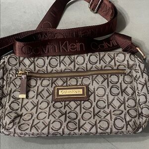 Calvin Klein Monogram Crossbody Bag in Brown and Gold